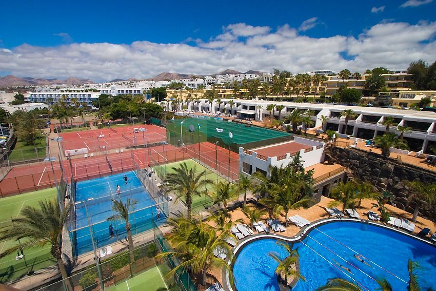 Aerial view of Hotel Fariones Lanzarote tennis padel courts and swimming pool in Puerto del Carmen