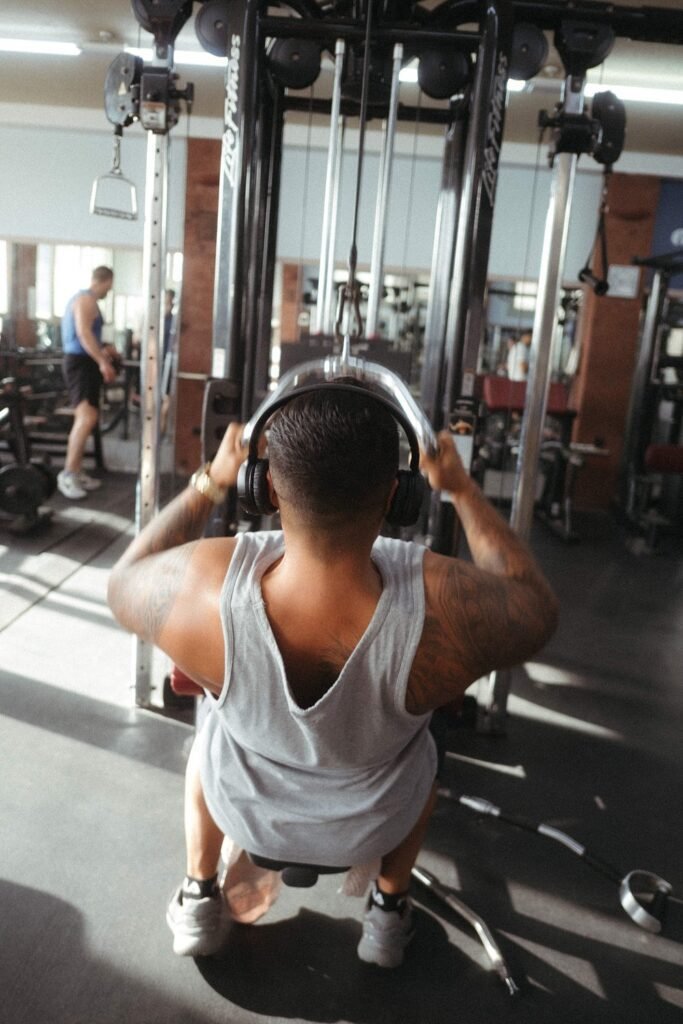 Guest using cable machine at the luxury hotel Lanzarote gym facilities at Hotel Fariones