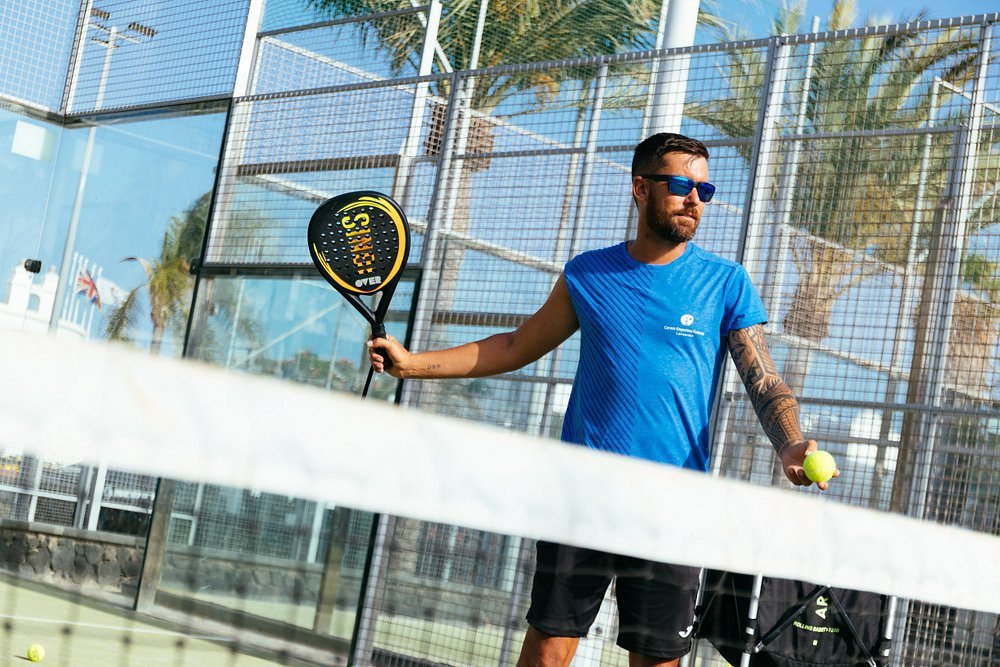 Man playing padel at luxury hotel Lanzarote Hotel Fariones sports facilities in Puerto del Carmen