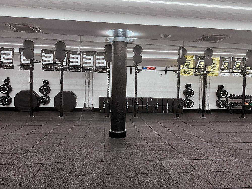 Modern fully equipped gym with weight racks and fitness area at luxury Hotel Fariones Lanzarote