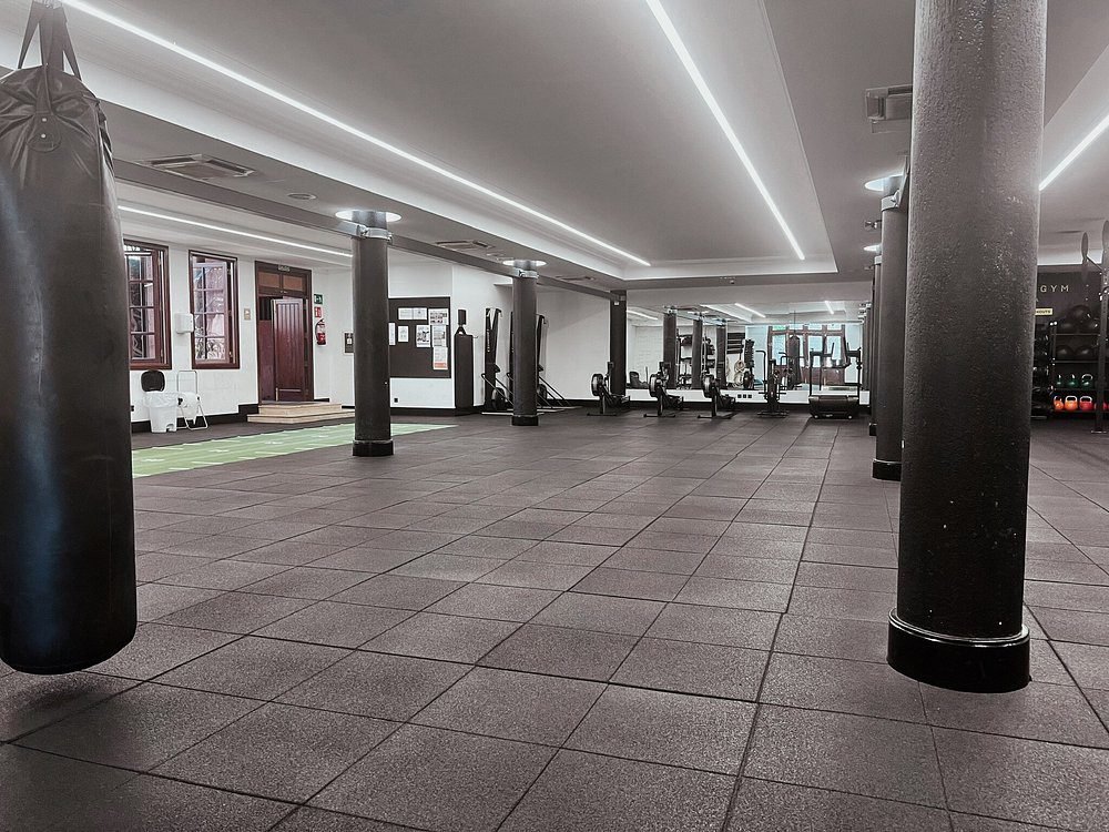 Modern gym with punching bag and fitness equipment at luxury Hotel Fariones Lanzarote Puerto del Car