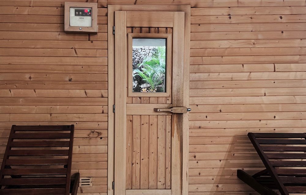 Wooden sauna door with temperature control at luxury Hotel Fariones Lanzarote spa facilities