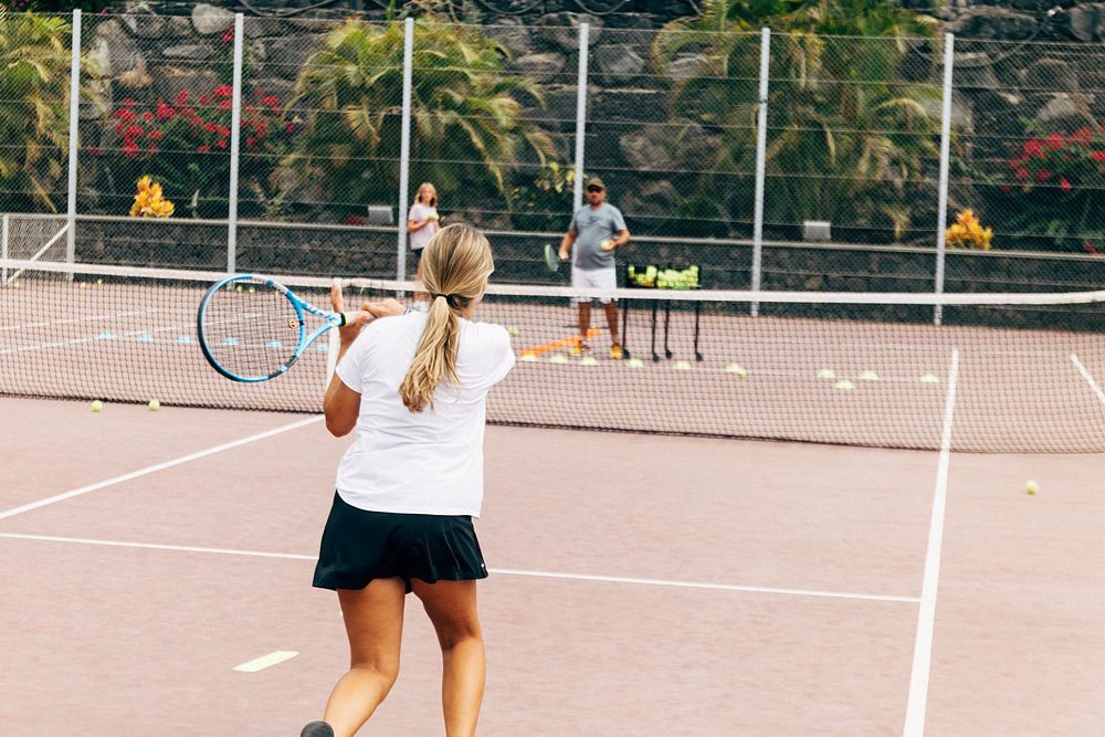 Woman playing tennis at Hotel Fariones Lanzarote, luxury hotel in Puerto del Carmen with sports faci